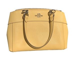 Coach Light/Pale Yellow Purse